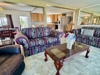 Well maintained manufactured home in active  age 55+ community on Cypress Creek Country Club - Boynton Beach in Florida - for sale on GolfHomes.com, golf home, golf lot
