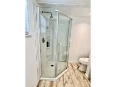 Well maintained manufactured home in active  age 55+ community on Cypress Creek Country Club - Boynton Beach in Florida - for sale on GolfHomes.com, golf home, golf lot