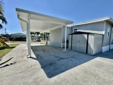 Well maintained manufactured home in active  age 55+ community on Cypress Creek Country Club - Boynton Beach in Florida - for sale on GolfHomes.com, golf home, golf lot