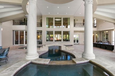 With gorgeous Classical Revival architecture, this estate sits on Isleworth Golf and Country Club in Florida - for sale on GolfHomes.com, golf home, golf lot