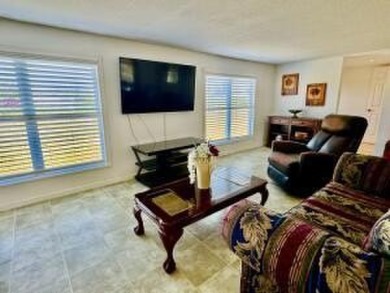 Well maintained manufactured home in active  age 55+ community on Cypress Creek Country Club - Boynton Beach in Florida - for sale on GolfHomes.com, golf home, golf lot