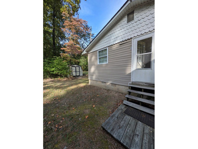 Charming 2-bed, 1-bath single-story home in the sought-after on Captains Cove Golf and Yacht Club in Virginia - for sale on GolfHomes.com, golf home, golf lot