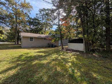 Charming 2-bed, 1-bath single-story home in the sought-after on Captains Cove Golf and Yacht Club in Virginia - for sale on GolfHomes.com, golf home, golf lot