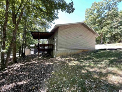 A circular concrete drive brings you to this darling home. It on  in Kentucky - for sale on GolfHomes.com, golf home, golf lot