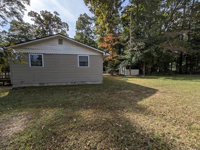 Charming 2-bed, 1-bath single-story home in the sought-after on Captains Cove Golf and Yacht Club in Virginia - for sale on GolfHomes.com, golf home, golf lot