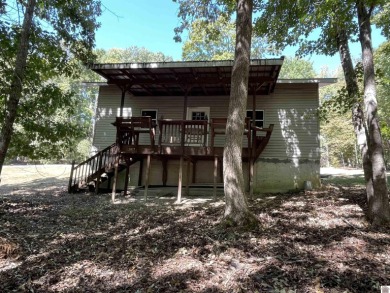 A circular concrete drive brings you to this darling home. It on  in Kentucky - for sale on GolfHomes.com, golf home, golf lot