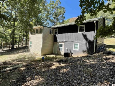 A circular concrete drive brings you to this darling home. It on  in Kentucky - for sale on GolfHomes.com, golf home, golf lot