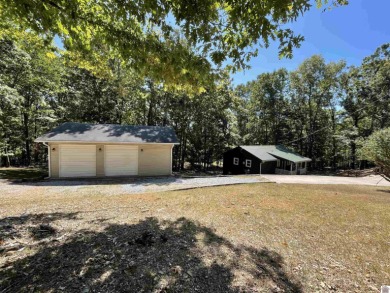 A circular concrete drive brings you to this darling home. It on  in Kentucky - for sale on GolfHomes.com, golf home, golf lot