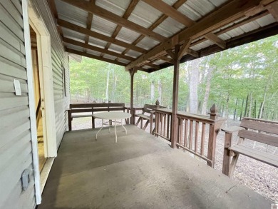 A circular concrete drive brings you to this darling home. It on  in Kentucky - for sale on GolfHomes.com, golf home, golf lot