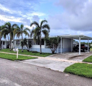 Well maintained manufactured home in active  age 55+ community on Cypress Creek Country Club - Boynton Beach in Florida - for sale on GolfHomes.com, golf home, golf lot