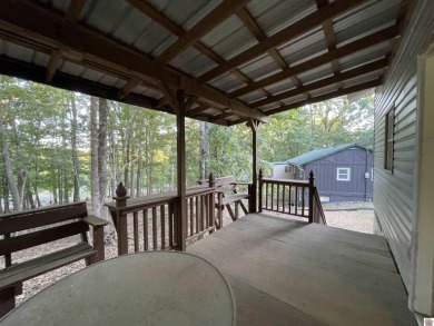 A circular concrete drive brings you to this darling home. It on  in Kentucky - for sale on GolfHomes.com, golf home, golf lot