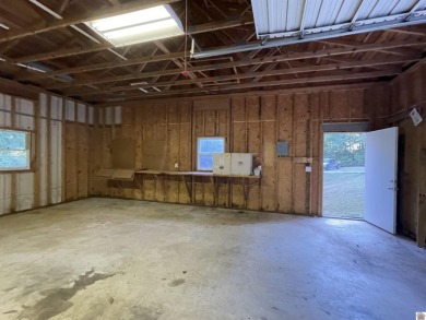 A circular concrete drive brings you to this darling home. It on  in Kentucky - for sale on GolfHomes.com, golf home, golf lot