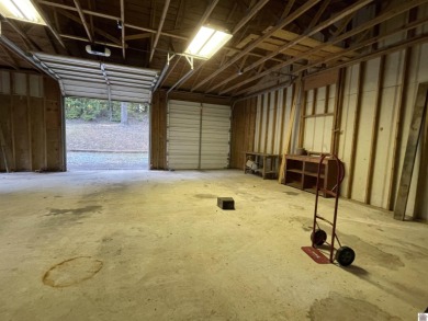 A circular concrete drive brings you to this darling home. It on  in Kentucky - for sale on GolfHomes.com, golf home, golf lot