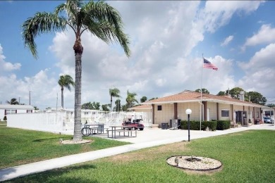 Well maintained manufactured home in active  age 55+ community on Cypress Creek Country Club - Boynton Beach in Florida - for sale on GolfHomes.com, golf home, golf lot