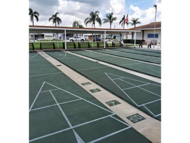 Well maintained manufactured home in active  age 55+ community on Cypress Creek Country Club - Boynton Beach in Florida - for sale on GolfHomes.com, golf home, golf lot