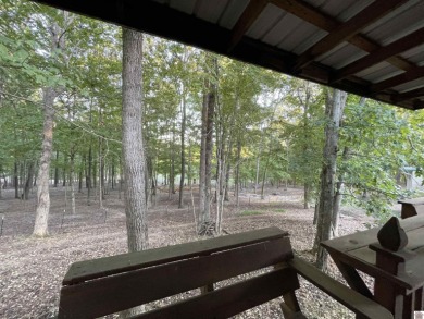 A circular concrete drive brings you to this darling home. It on  in Kentucky - for sale on GolfHomes.com, golf home, golf lot