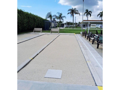 Well maintained manufactured home in active  age 55+ community on Cypress Creek Country Club - Boynton Beach in Florida - for sale on GolfHomes.com, golf home, golf lot