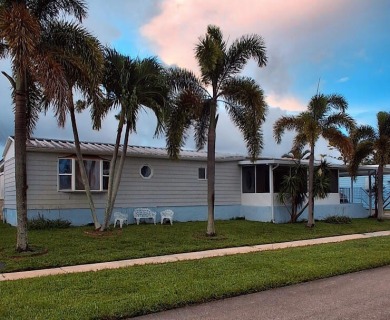Well maintained manufactured home in active  age 55+ community on Cypress Creek Country Club - Boynton Beach in Florida - for sale on GolfHomes.com, golf home, golf lot