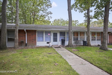 Step into this beautifully remodeled 2-bedroom, 1-bath condo in on Greenbriar Woodlands in New Jersey - for sale on GolfHomes.com, golf home, golf lot