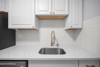 Step into this beautifully remodeled 2-bedroom, 1-bath condo in on Greenbriar Woodlands in New Jersey - for sale on GolfHomes.com, golf home, golf lot