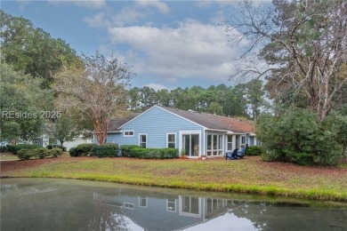 This exceptional residence boasts a spacious two-car garage and on Okatie Creek Golf Club in South Carolina - for sale on GolfHomes.com, golf home, golf lot