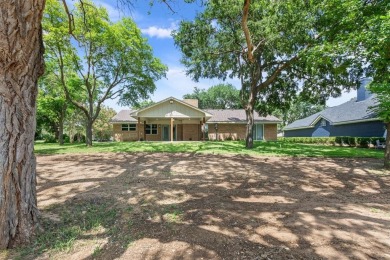 Welcome to your dream home in the heart of one of the city's on The Lake Country Club - Lake Waco in Texas - for sale on GolfHomes.com, golf home, golf lot