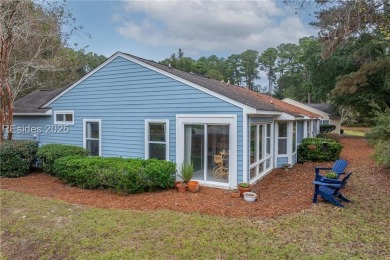 This exceptional residence boasts a spacious two-car garage and on Okatie Creek Golf Club in South Carolina - for sale on GolfHomes.com, golf home, golf lot