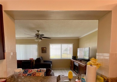 This home has  2-bedrooms, 2-bathrooms, 1,129 square feet and a on Mainlands Golf Club in Florida - for sale on GolfHomes.com, golf home, golf lot