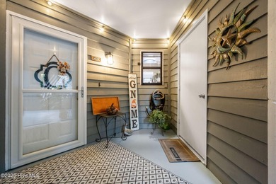 Fresh, bright, and move-in ready--this ground-floor 2BR/2BA on Olde Point Golf and Country Club in North Carolina - for sale on GolfHomes.com, golf home, golf lot