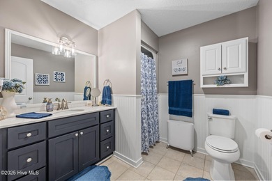 Fresh, bright, and move-in ready--this ground-floor 2BR/2BA on Olde Point Golf and Country Club in North Carolina - for sale on GolfHomes.com, golf home, golf lot