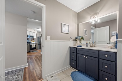 Fresh, bright, and move-in ready--this ground-floor 2BR/2BA on Olde Point Golf and Country Club in North Carolina - for sale on GolfHomes.com, golf home, golf lot