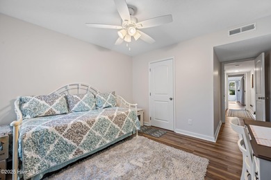 Fresh, bright, and move-in ready--this ground-floor 2BR/2BA on Olde Point Golf and Country Club in North Carolina - for sale on GolfHomes.com, golf home, golf lot