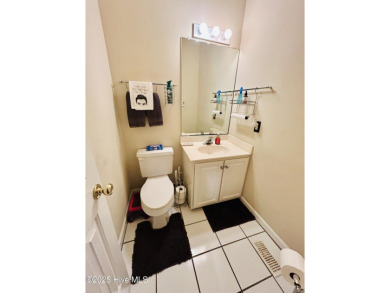 You wont want to miss this bright and airy 5 bedroom, 2 1/2 bath on Rock Creek Country Club in North Carolina - for sale on GolfHomes.com, golf home, golf lot