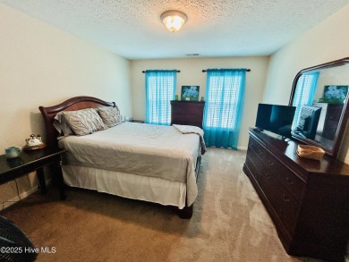 You wont want to miss this bright and airy 5 bedroom, 2 1/2 bath on Rock Creek Country Club in North Carolina - for sale on GolfHomes.com, golf home, golf lot