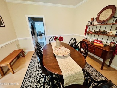 You wont want to miss this bright and airy 5 bedroom, 2 1/2 bath on Rock Creek Country Club in North Carolina - for sale on GolfHomes.com, golf home, golf lot
