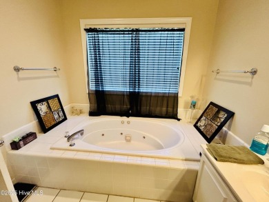 You wont want to miss this bright and airy 5 bedroom, 2 1/2 bath on Rock Creek Country Club in North Carolina - for sale on GolfHomes.com, golf home, golf lot