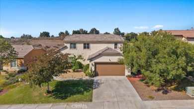 Welcome to this spacious 5 bedroom, 3 bath home nestled in the on  in California - for sale on GolfHomes.com, golf home, golf lot