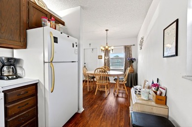 Welcome to effortless Florida living in this beautifully on The American Golf Club in Florida - for sale on GolfHomes.com, golf home, golf lot