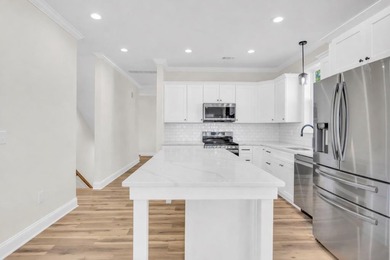 Discover the epitome of lakeside living at 301 Portland Circle on The Links At Stoney Point in South Carolina - for sale on GolfHomes.com, golf home, golf lot