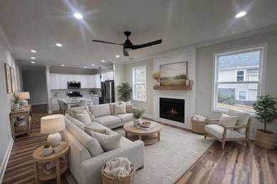 Discover the epitome of lakeside living at 301 Portland Circle on The Links At Stoney Point in South Carolina - for sale on GolfHomes.com, golf home, golf lot