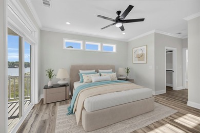 Discover the epitome of lakeside living at 301 Portland Circle on The Links At Stoney Point in South Carolina - for sale on GolfHomes.com, golf home, golf lot