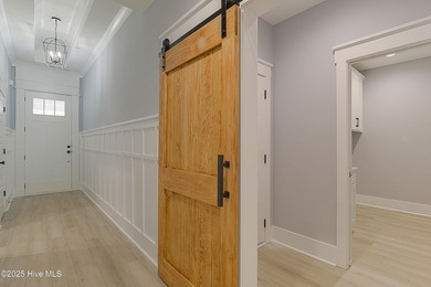 Looking for a brand-new home that showcases quality on Brunswick Plantation and Golf Resorts in North Carolina - for sale on GolfHomes.com, golf home, golf lot