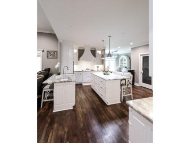 Built in 2018, this stunning custom home sits right on the #5 on Mystic Creek Golf Club in Arkansas - for sale on GolfHomes.com, golf home, golf lot