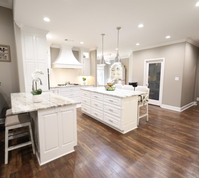 Built in 2018, this stunning custom home sits right on the #5 on Mystic Creek Golf Club in Arkansas - for sale on GolfHomes.com, golf home, golf lot