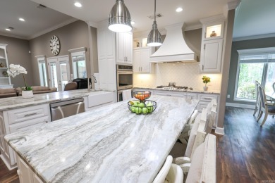 Built in 2018, this stunning custom home sits right on the #5 on Mystic Creek Golf Club in Arkansas - for sale on GolfHomes.com, golf home, golf lot