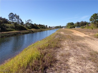 This Great waterfront lot is on the Fox canal providing a water on Lehigh Resort Club in Florida - for sale on GolfHomes.com, golf home, golf lot