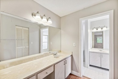 FHA AND LOW DOWNPAYMENT AVAILABLE! Discover this beautifully on Woodmont Country Club in Florida - for sale on GolfHomes.com, golf home, golf lot