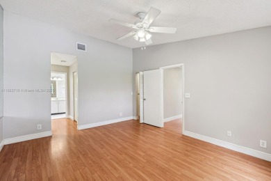 FHA AND LOW DOWNPAYMENT AVAILABLE! Discover this beautifully on Woodmont Country Club in Florida - for sale on GolfHomes.com, golf home, golf lot