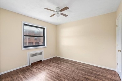 Discover comfort and convenience in this move-in-ready on Clearview Park Golf Course in New York - for sale on GolfHomes.com, golf home, golf lot