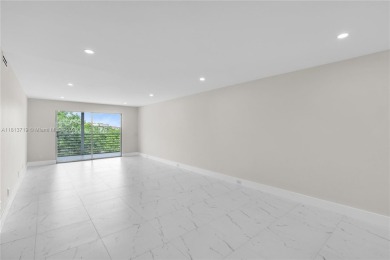 REAL OPPORTUNITY!! COMPLETELY RENOVATED, 2 BEDS- 2 BATHS MODERN on Wynmoor Golf Course in Florida - for sale on GolfHomes.com, golf home, golf lot